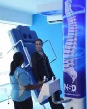 women getting spinal decompression therapy via the RxDecom 