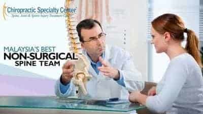 chiropractic consultation of female patient at CSC